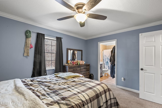 bedroom with baseboards, light carpet, and crown molding