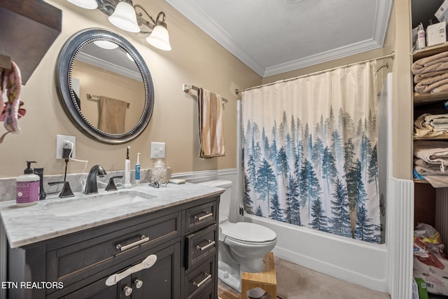 bathroom featuring toilet, ornamental molding, wainscoting, vanity, and shower / bathtub combination with curtain