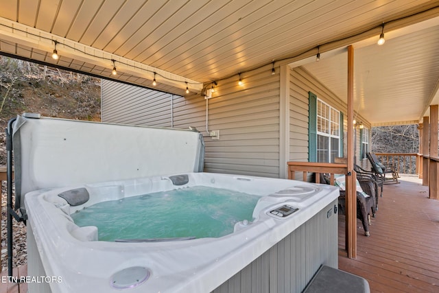 exterior space featuring a hot tub