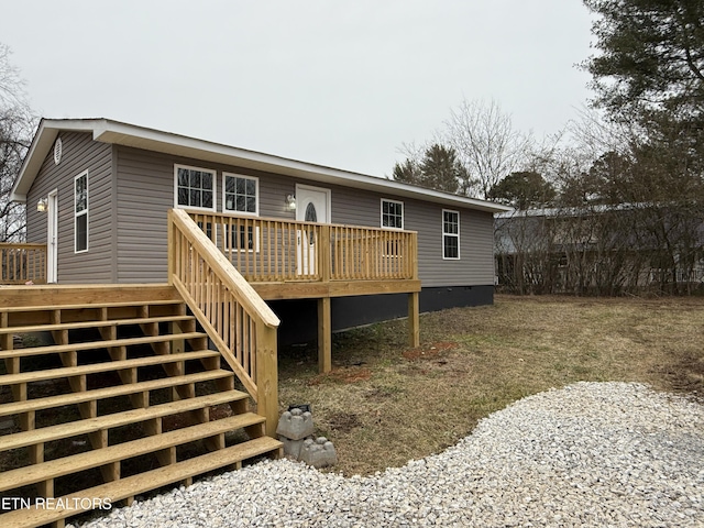 rear view of house with a deck