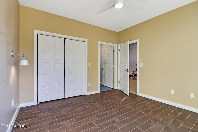 unfurnished bedroom featuring dark hardwood / wood-style flooring, a closet, and ceiling fan