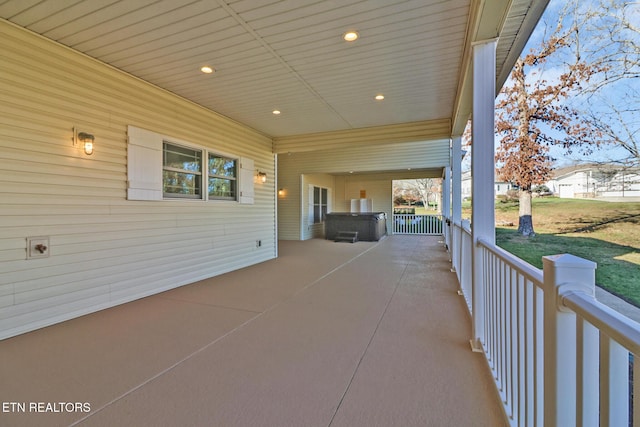 view of patio featuring a porch