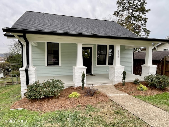 bungalow-style house featuring covered porch