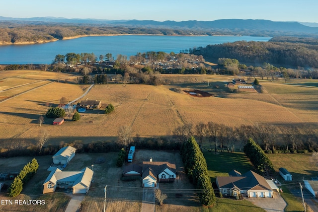 bird's eye view featuring a water and mountain view