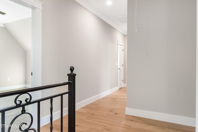 hall with light wood-type flooring