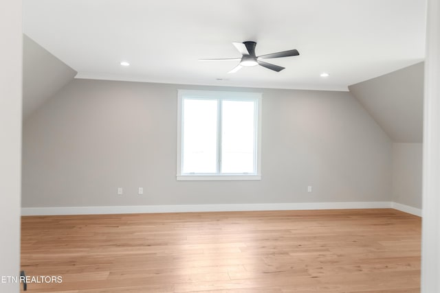 additional living space with ceiling fan, lofted ceiling, and light hardwood / wood-style floors