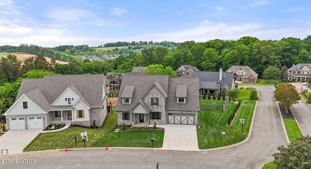 drone / aerial view featuring a residential view