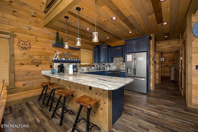 kitchen featuring blue cabinetry, stainless steel fridge with ice dispenser, wooden ceiling, kitchen peninsula, and light stone countertops