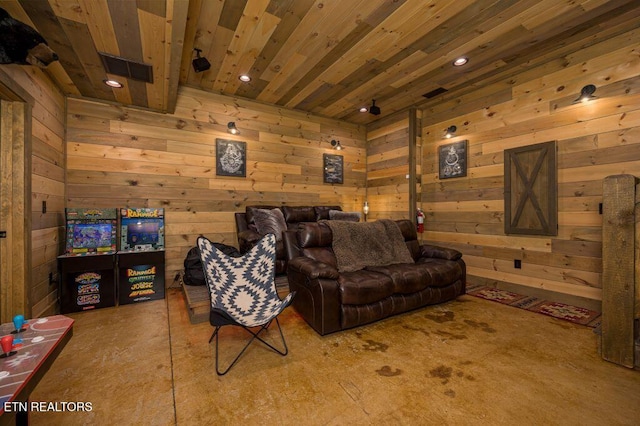 home theater with wood ceiling and wood walls