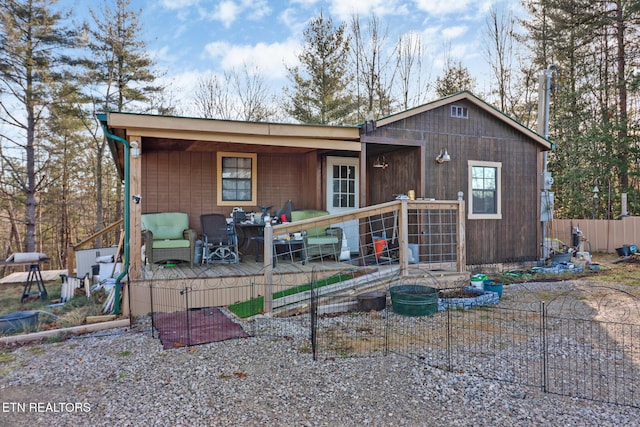 ranch-style house with a deck