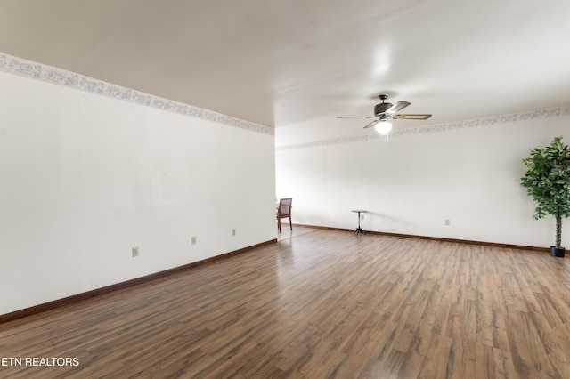 unfurnished room with hardwood / wood-style flooring and ceiling fan