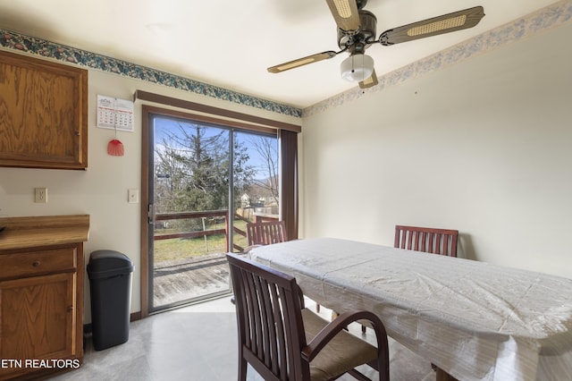 dining room featuring ceiling fan