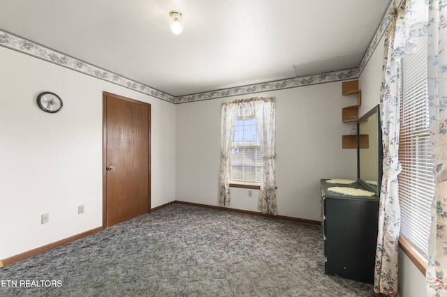 carpeted bedroom with a closet