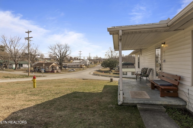 view of yard featuring a porch