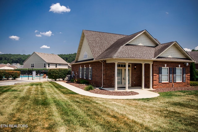 view of front of home with a front yard