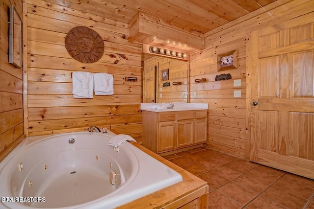 bathroom with wooden ceiling, vanity, wooden walls, a relaxing tiled tub, and tile patterned flooring