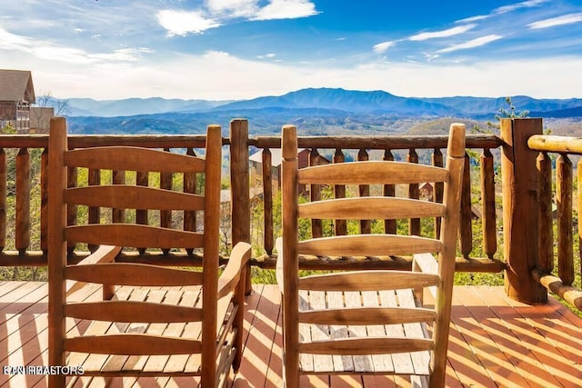 view of gate with a mountain view