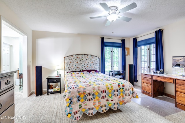 184 Amohi Way, Loudon, TN 37774 - bedroom with a textured ceiling, ceiling fan, an office area, and baseboards
