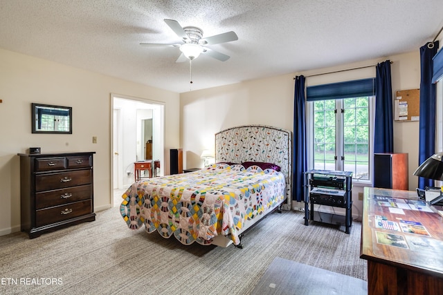184 Amohi Way, Loudon, TN 37774 - carpeted bedroom with a textured ceiling, a ceiling fan, and baseboards