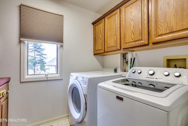 184 Amohi Way, Loudon, TN 37774 - clothes washing area featuring cabinet space, washer and dryer, and baseboards