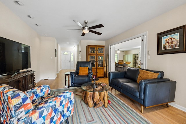 3516 Bluff Point Dr, Knoxville, TN 37920 - living area featuring ceiling fan, light wood-style flooring, and baseboards