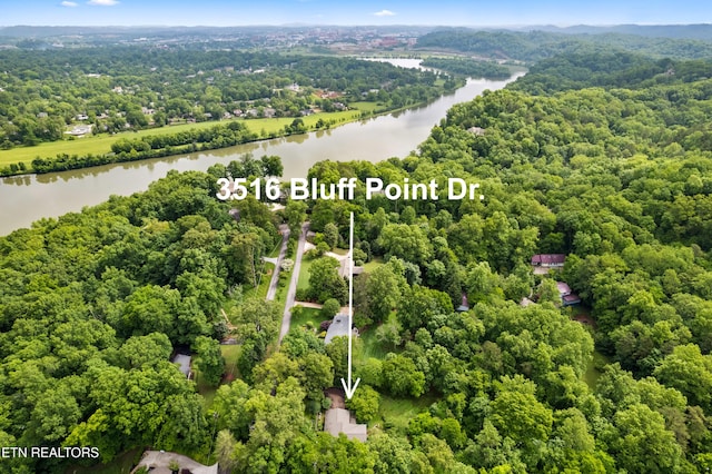 3516 Bluff Point Dr, Knoxville, TN 37920 - view of property location with a large body of water, a heavily wooded area, and property boundaries highlighted