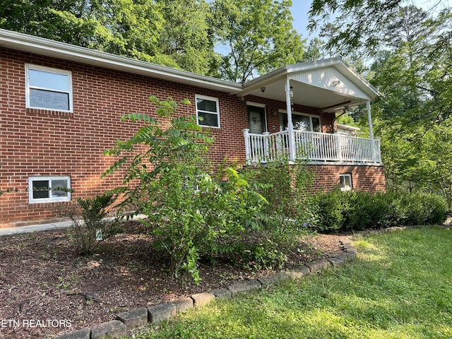 111 Old Evacuation Ln, Oliver Springs, TN 37840 - ranch-style house with brick siding and a front lawn