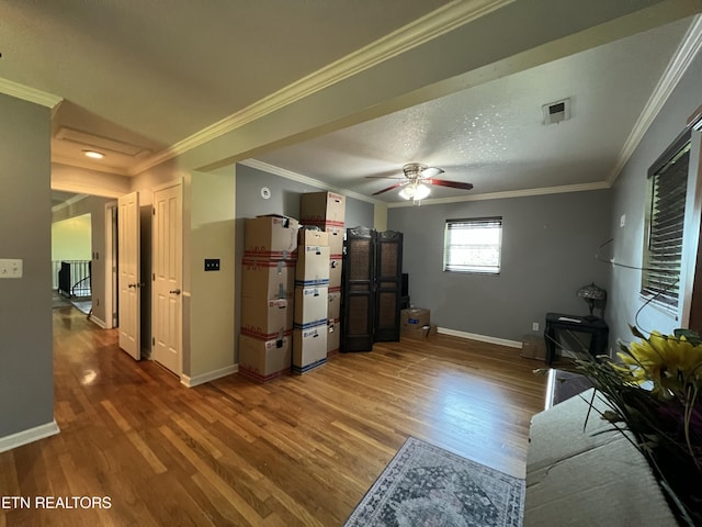 111 Old Evacuation Ln, Oliver Springs, TN 37840 - living area featuring baseboards, wood finished floors, ornamental molding, and ceiling fan