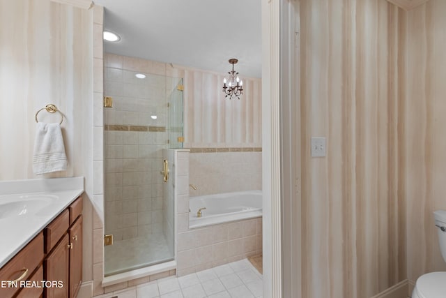 full bathroom with vanity, shower with separate bathtub, tile patterned floors, and toilet