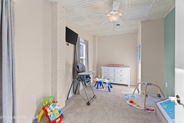 recreation room featuring ceiling fan and light carpet