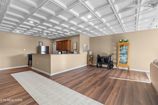 living room with dark hardwood / wood-style flooring