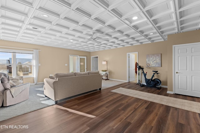 living room featuring coffered ceiling and hardwood / wood-style floors