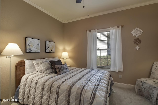 bedroom with carpet, ornamental molding, baseboards, and ceiling fan