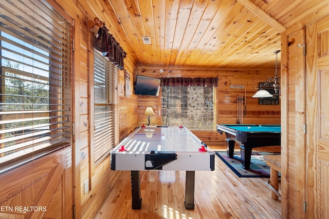 game room with wood ceiling, pool table, light hardwood / wood-style flooring, and wood walls