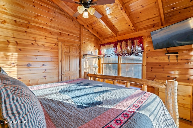 bedroom with vaulted ceiling with beams, wood ceiling, and wood walls