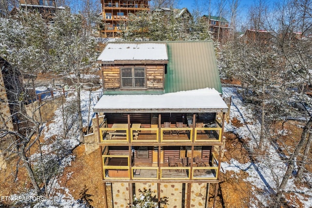 exterior space featuring a balcony