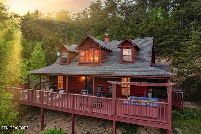 view of front of home with a deck