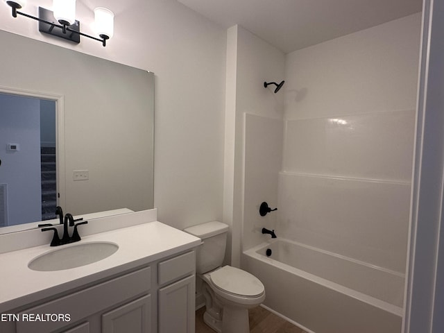 full bathroom with vanity, toilet, and shower / bathing tub combination