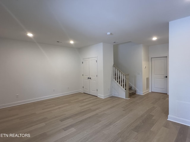 unfurnished room featuring light hardwood / wood-style floors