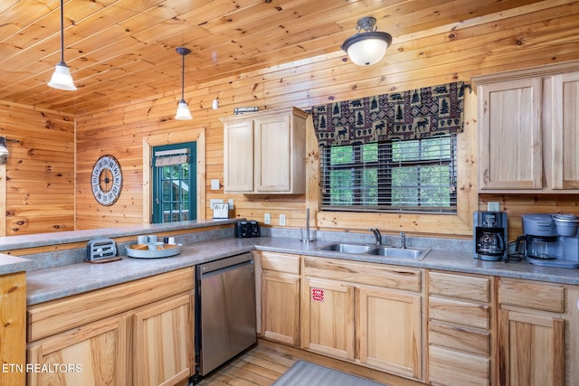 kitchen with light brown cabinetry, decorative light fixtures, and dishwasher