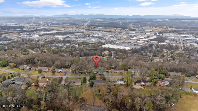 drone / aerial view featuring a mountain view