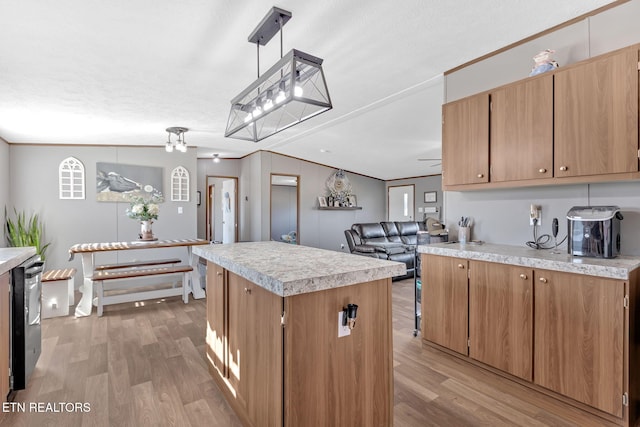 kitchen featuring wine cooler, a center island, light hardwood / wood-style floors, and hanging light fixtures