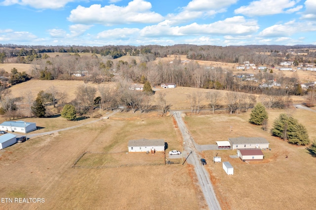 birds eye view of property featuring a rural view