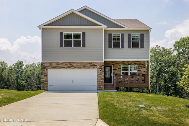 12468 Hatmaker Ln, Knoxville, TN 37932 - craftsman inspired home with stone siding, driveway, board and batten siding, a front lawn, and a garage