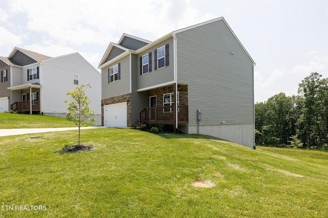12468 Hatmaker Ln, Knoxville, TN 37932 - craftsman house featuring stone siding, a garage, a front yard, and driveway
