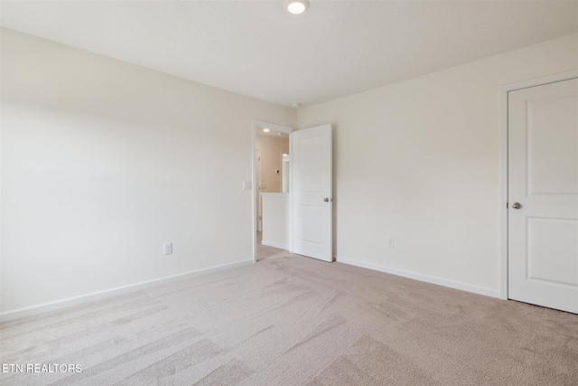 12468 Hatmaker Ln, Knoxville, TN 37932 - unfurnished bedroom featuring light colored carpet and baseboards
