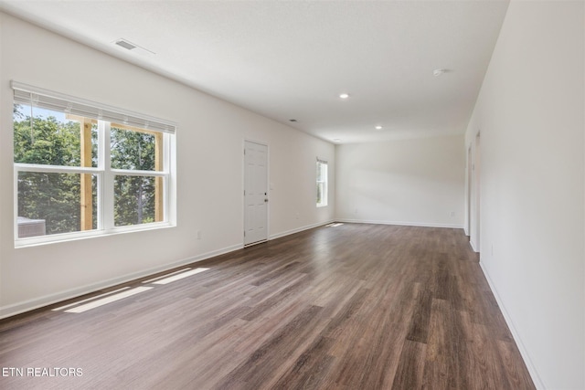 12468 Hatmaker Ln, Knoxville, TN 37932 - unfurnished living room featuring wood finished floors, baseboards, and recessed lighting