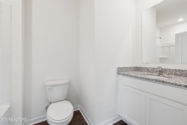 12468 Hatmaker Ln, Knoxville, TN 37932 - full bathroom featuring vanity, baseboards, toilet, and wood finished floors