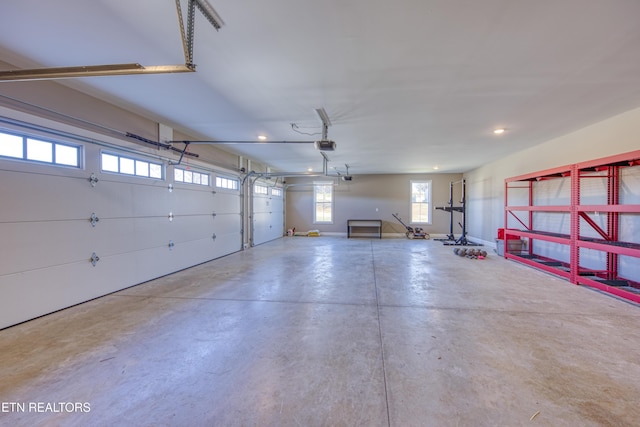 garage featuring a garage door opener