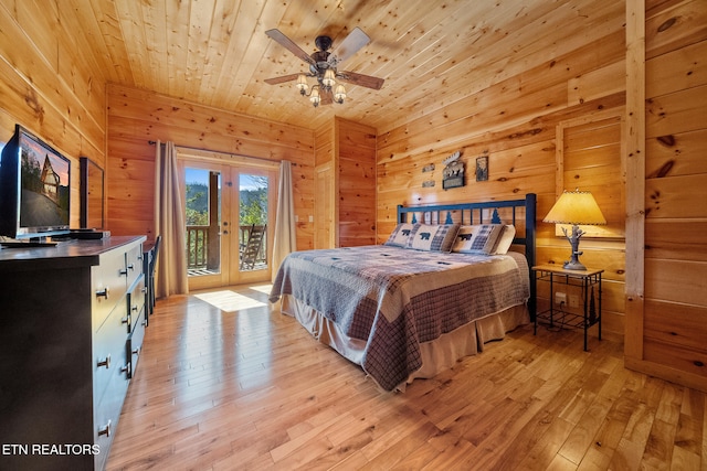 bedroom featuring wood ceiling, access to outside, french doors, and light wood-type flooring